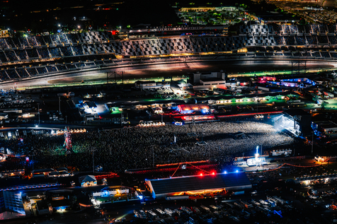 Aerial view of a stadium at nightDescription automatically generated